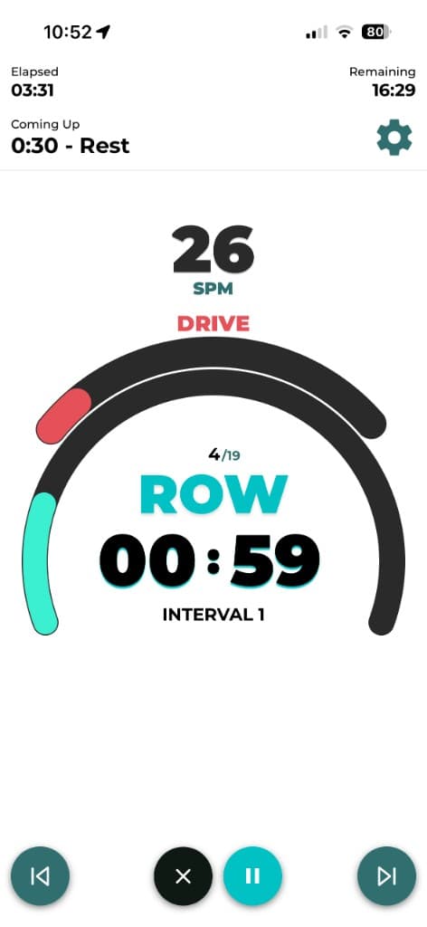 Live rowing workout screen with SPM target, interval timer, and row recover guidance