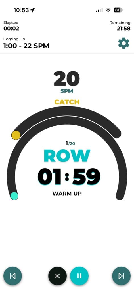 Live rowing workout screen with SPM target, interval timer, and row recover guidance