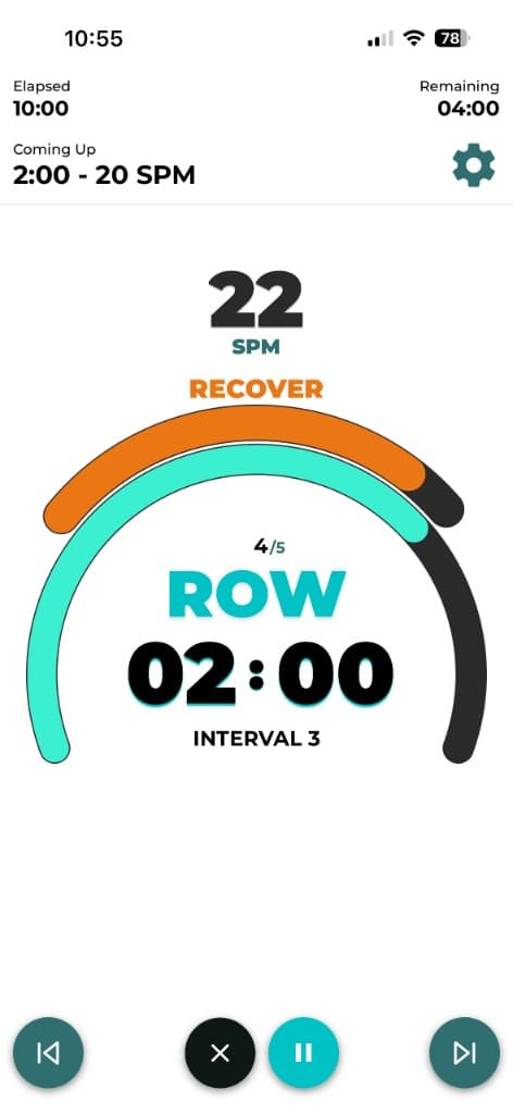 Live rowing workout screen with SPM target, interval timer, and row recover guidance