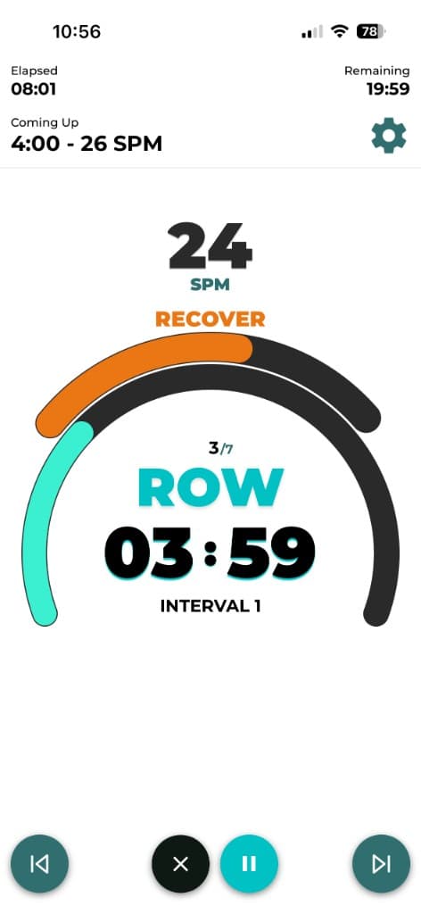 Live rowing workout screen with SPM target, interval timer, and row recover guidance