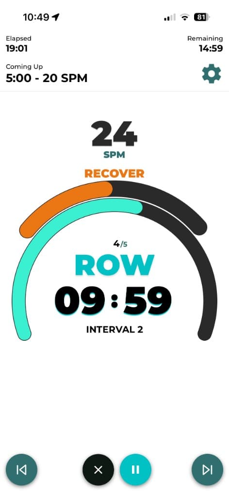 Live rowing workout screen with SPM target, interval timer, and row recover guidance